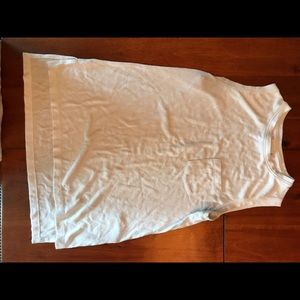 White sleeveless top with pocket